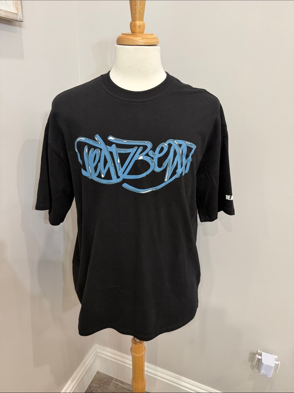 Black Short-Sleeve Tee with Blue Script Graphic